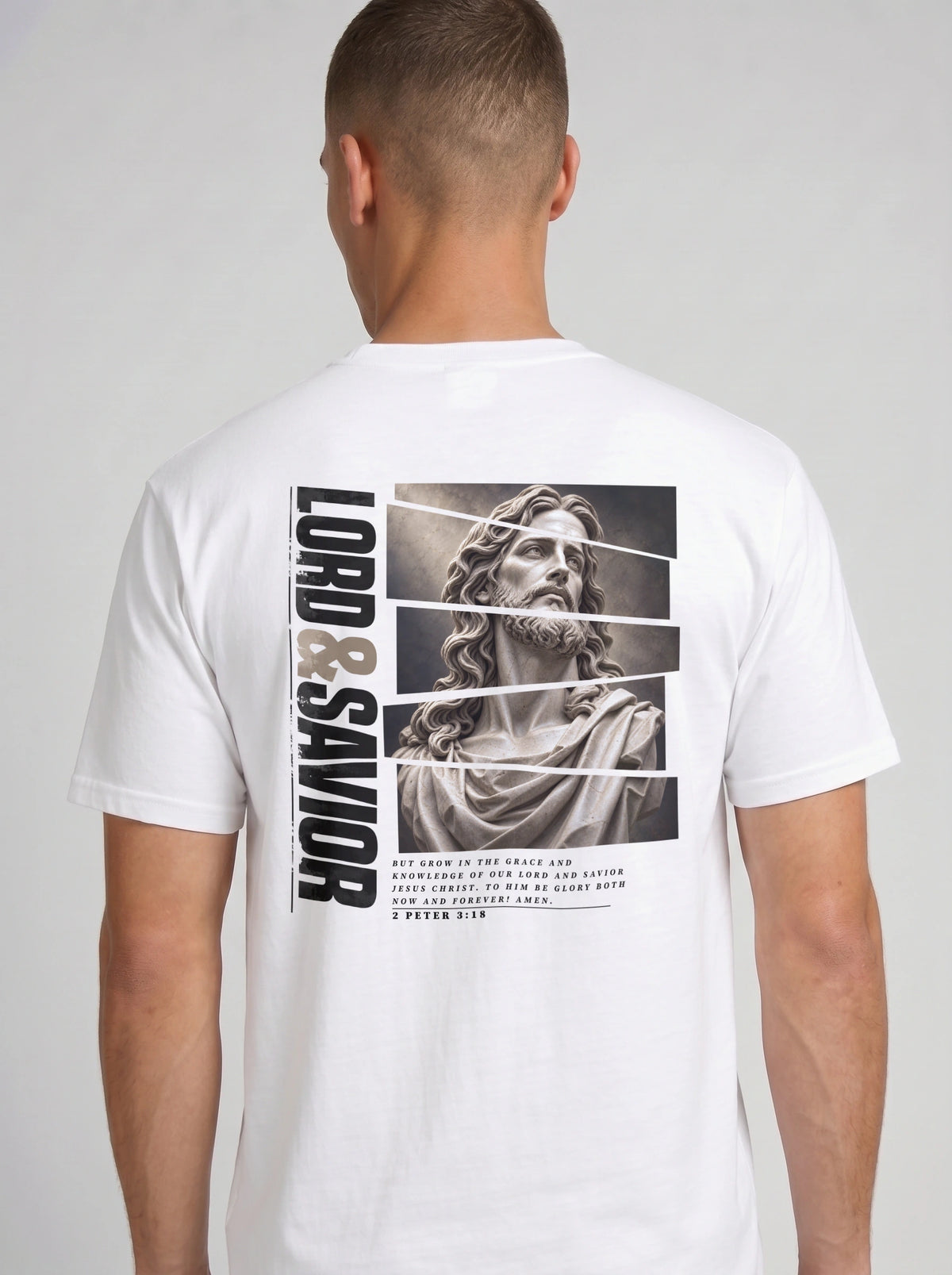 Person shown from behind wearing a white T-shirt with a grayscale Jesus graphic, vertical “Lord & Savior” text, and 2 Peter 3:18.