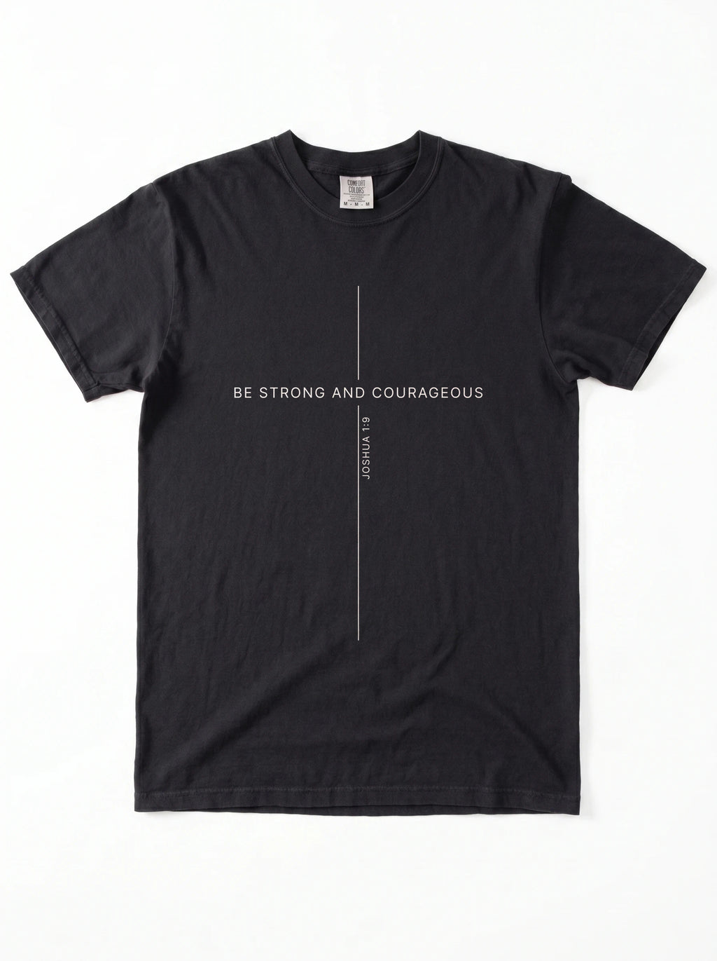 A black short-sleeve crewneck t-shirt with a minimalist white graphic on the chest featuring a vertical line and the text 'BE STRONG AND COURAGEOUS' and 'Joshua 1:9'