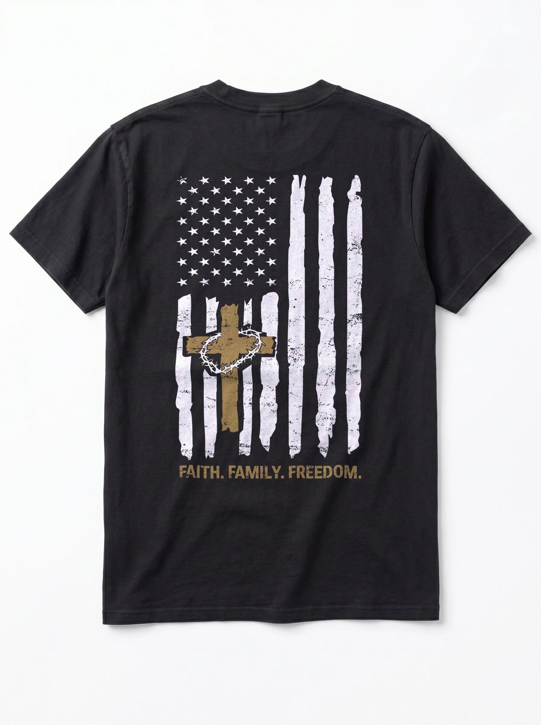 A black short-sleeve t-shirt shown from the back, featuring a distressed white American flag graphic with a brown cross and a gold chain link design in the center, and the text 'FAITH, FAMILY, FREEDOM.' printed below in gold.