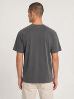 Back view of man wearing charcoal Comfort Colors garment-dyed Victory t-shirt