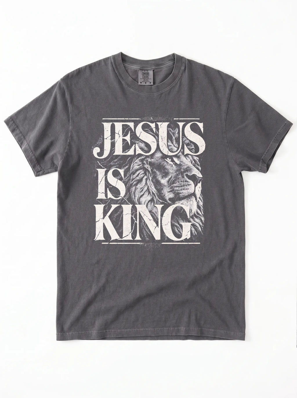 A dark gray crewneck t-shirt featuring a distressed white graphic print that reads 'JESUS IS KING' with a lion illustration, laid flat against a white background.