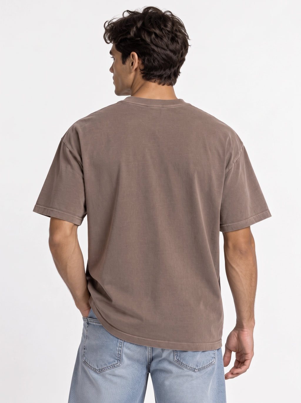 Person shown from behind wearing a plain faded brown T-shirt with no back print.