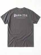A dark gray short-sleeve t-shirt shown from the back, featuring the text 'Psalm 23:4' printed in a white gothic font with smaller text underneath.