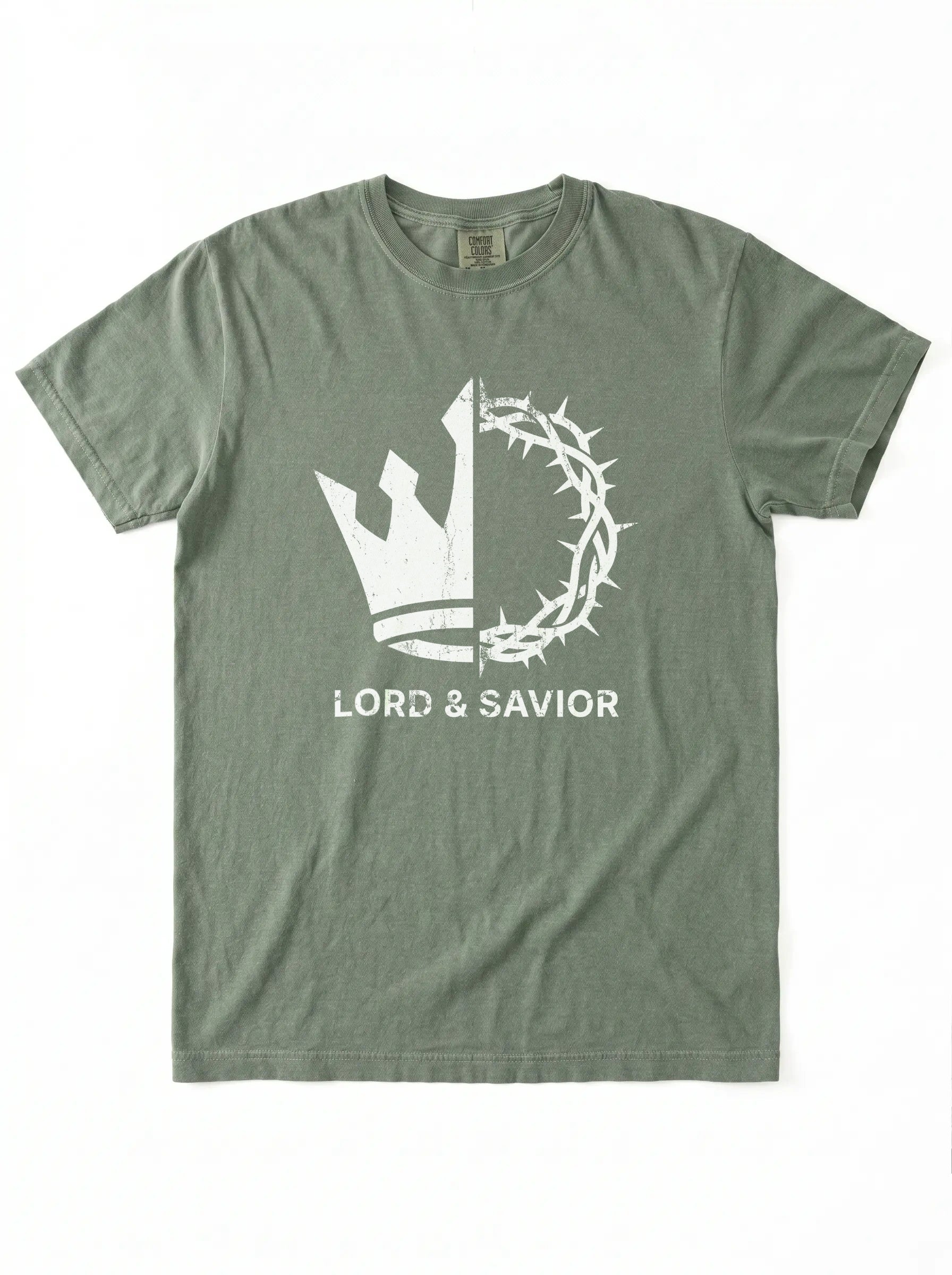 An olive green short-sleeve t-shirt with a white graphic on the front showing a split crown of thorns and cross design with the text 'LORD & SAVIOR' underneath, displayed flat against a white background.