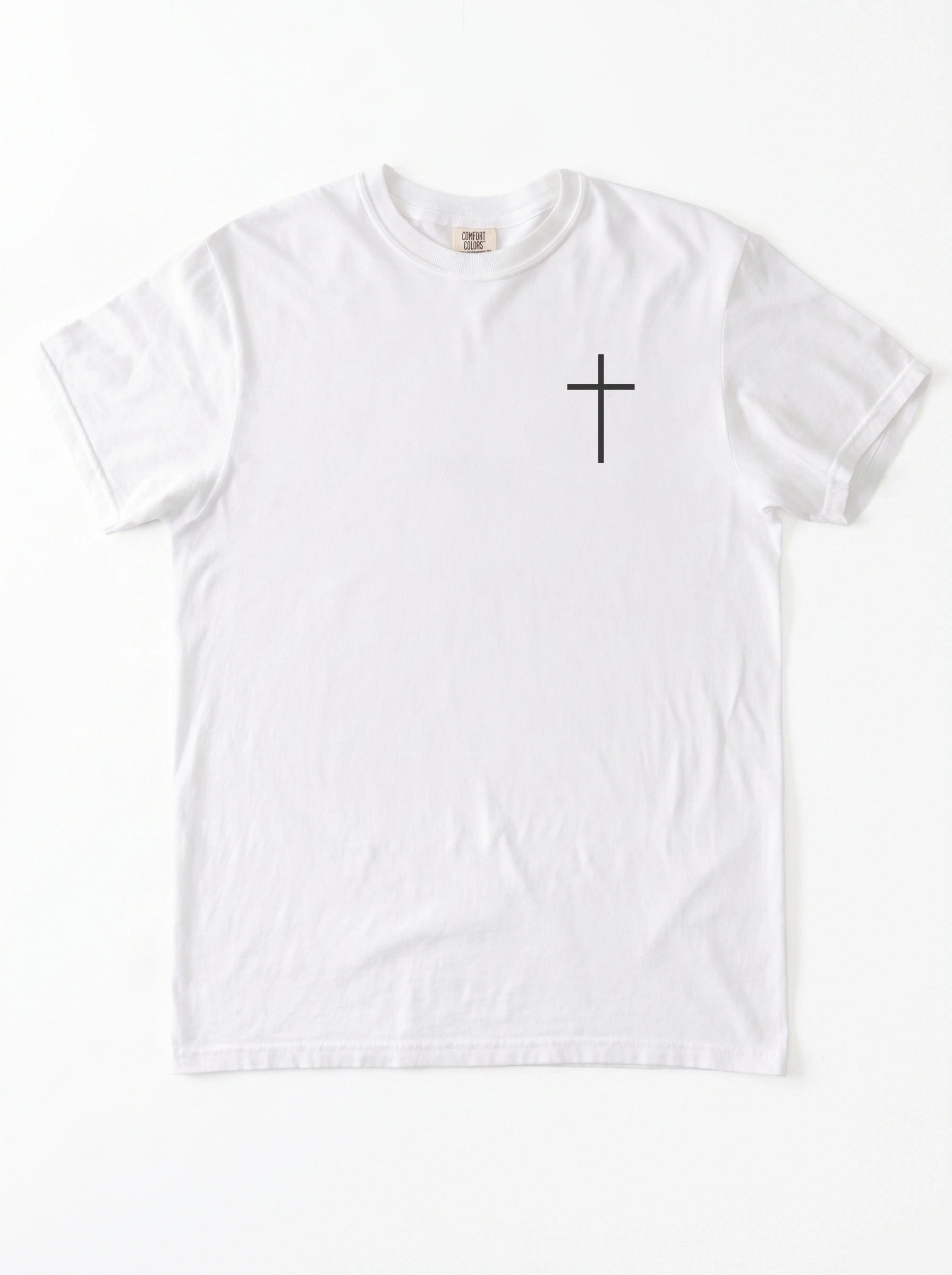 A white short-sleeve crewneck t-shirt with a small black Christian cross printed on the left chest, displayed flat against a clean white background.