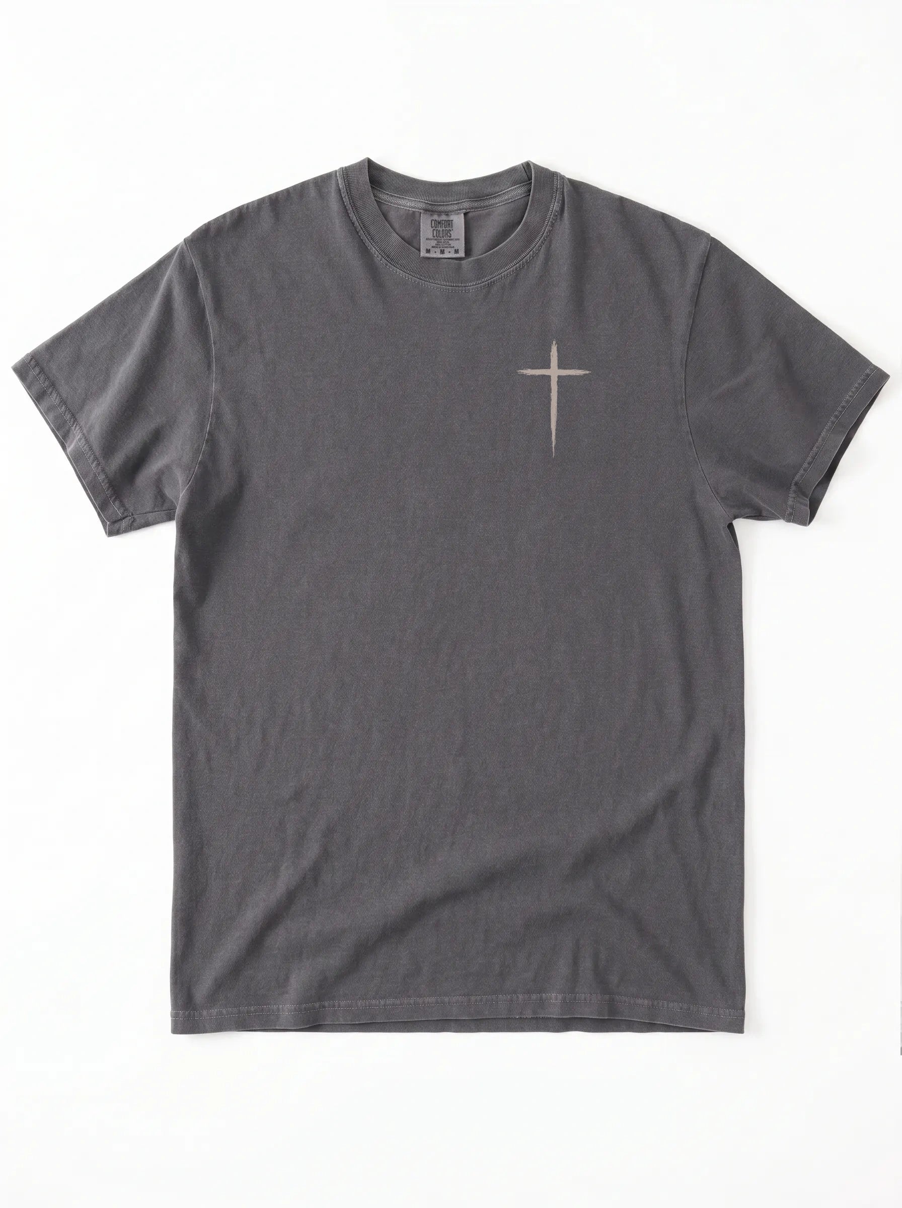 A dark gray crewneck t-shirt with cross printed in beige on the chest, laid flat against a white background.