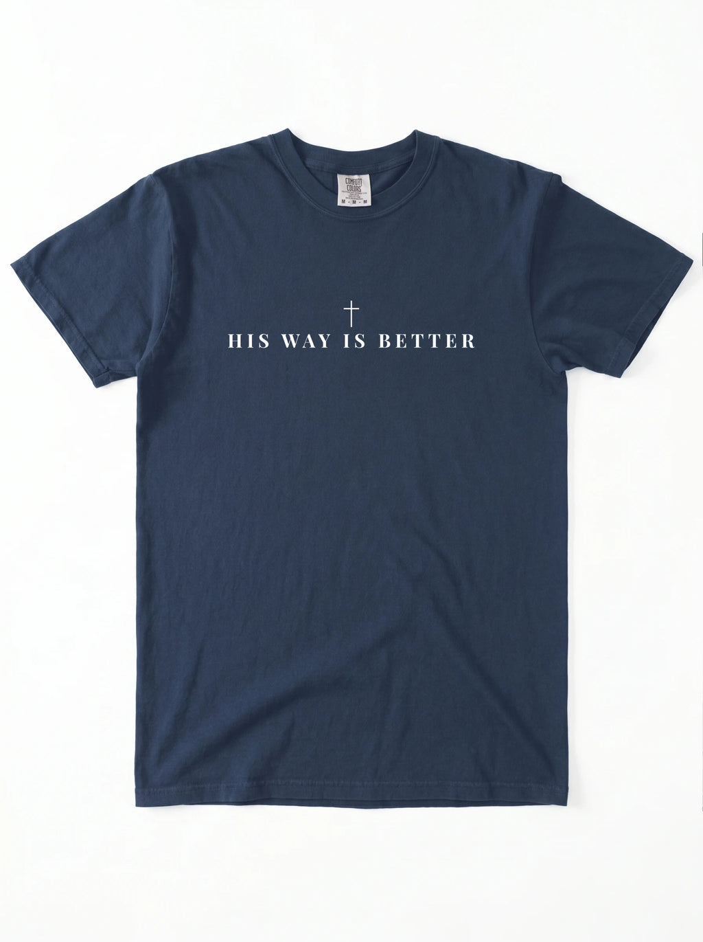 A navy blue short-sleeve crewneck t-shirt with the text 'HIS WAY IS BETTER' and a small cross printed in white on the chest, laid flat against a white background.