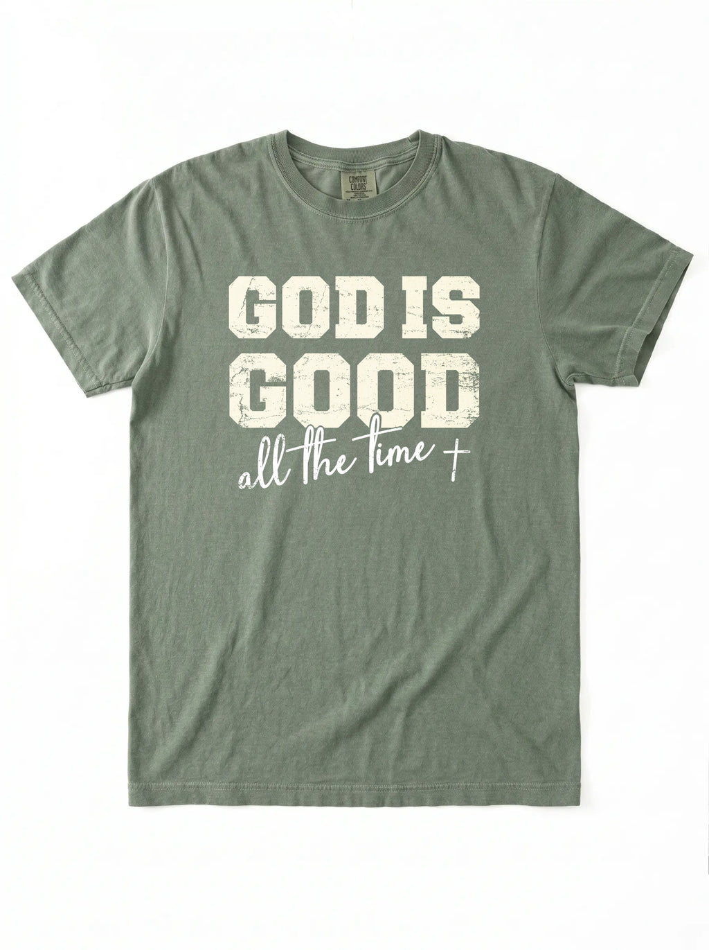 An olive green short-sleeve t-shirt with a distressed white graphic print on the front that reads 'GOD IS GOOD all the time +'.
