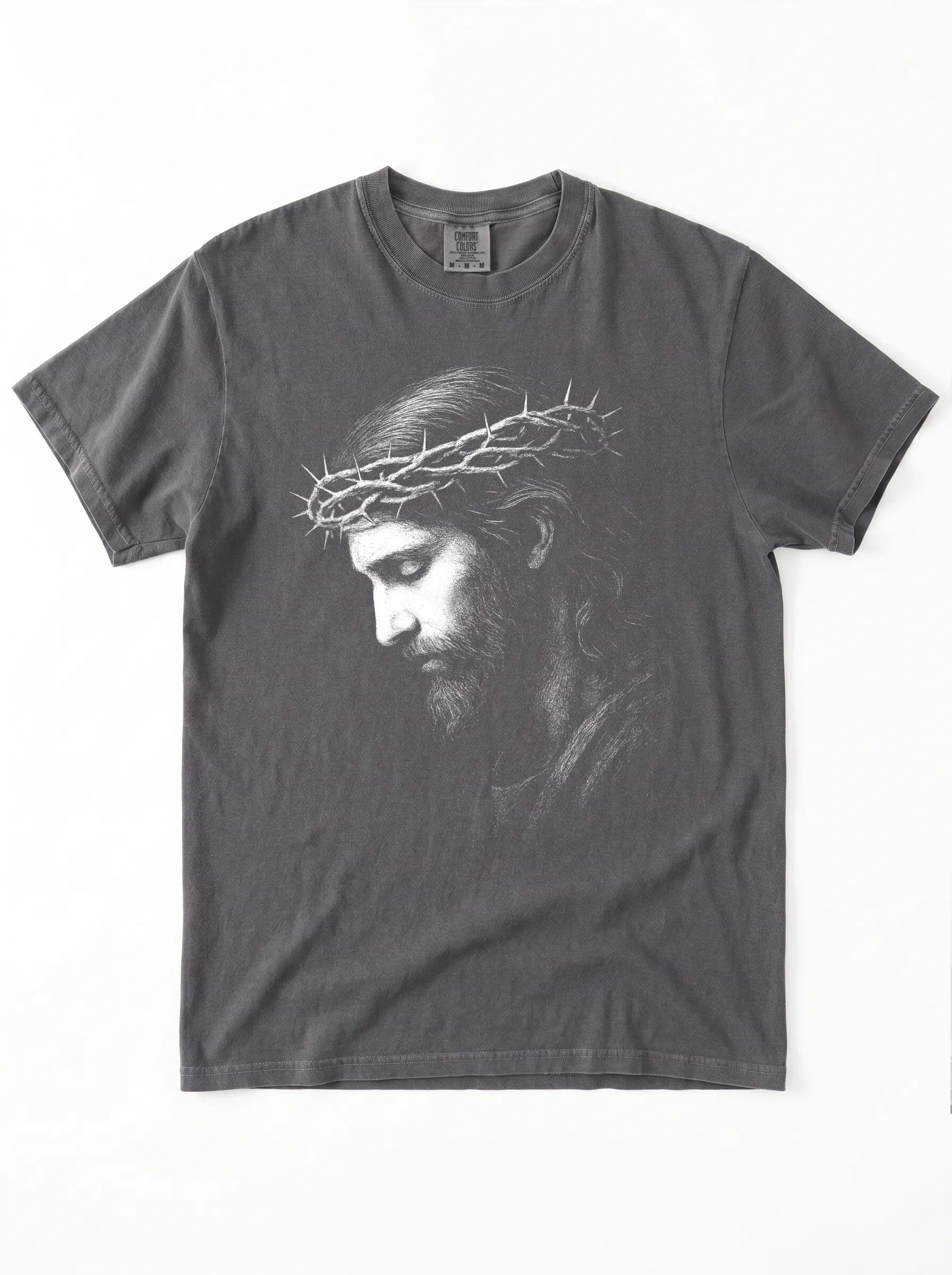 A dark gray crewneck t-shirt featuring a black and white graphic print of Jesus Christ wearing a crown of thorns, shown flat against a white background.