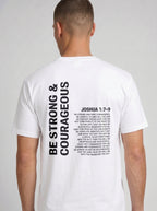 Person shown from behind in a white T-shirt with “Be strong & courageous” and Joshua 1:7–9 printed in black.