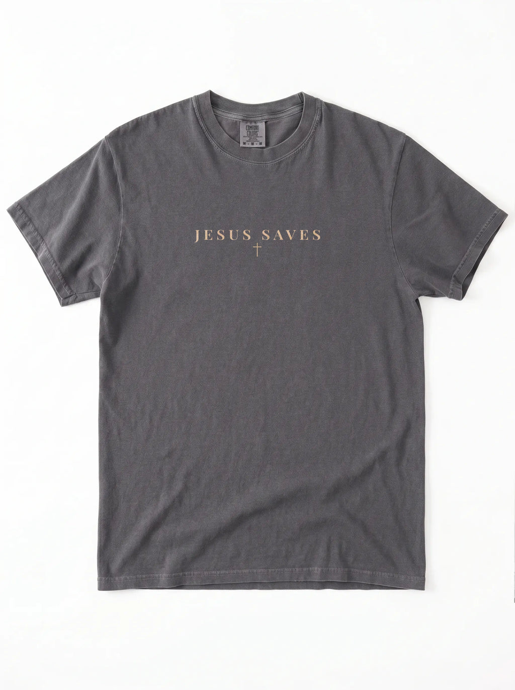 Charcoal-gray short-sleeve T-shirt laid flat on a white background, featuring beige “JESUS SAVES” text with a small cross printed below.
