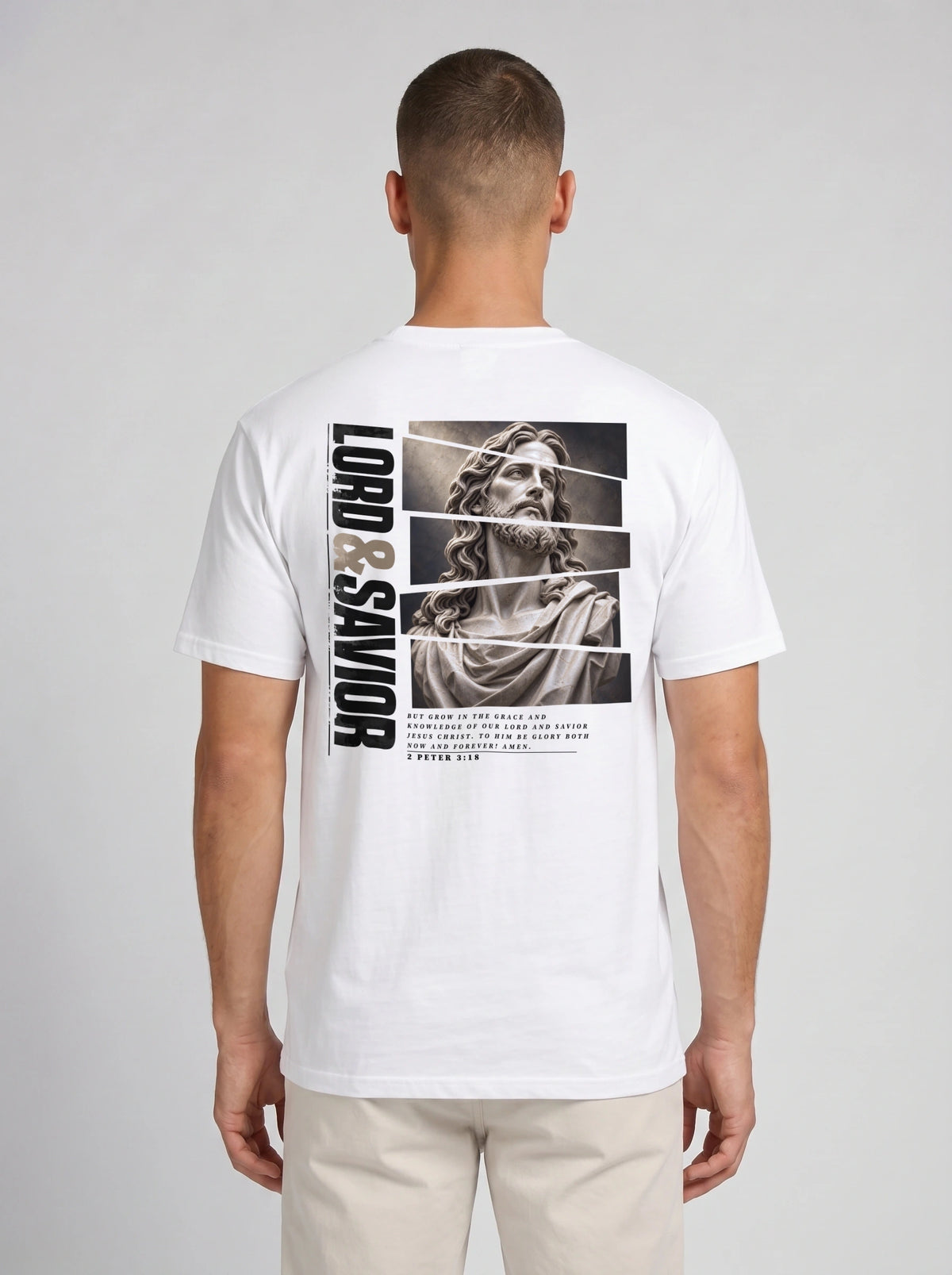 Person shown from behind wearing a white T-shirt with a grayscale Jesus graphic, vertical “Lord & Savior” text, and 2 Peter 3:18.