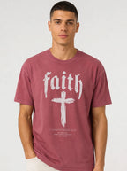 Person wearing a muted red T-shirt with “faith,” a large cross, and the text “1 Corinthians 16:13 — Be watchful. Stand firm in the faith. Be strong.”