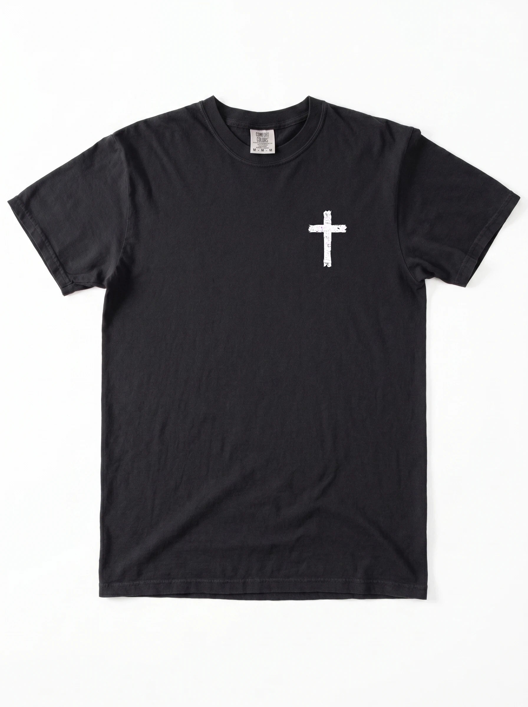 A black short-sleeve crewneck t-shirt with a small white distressed cross printed on the left chest, displayed flat against a white background.