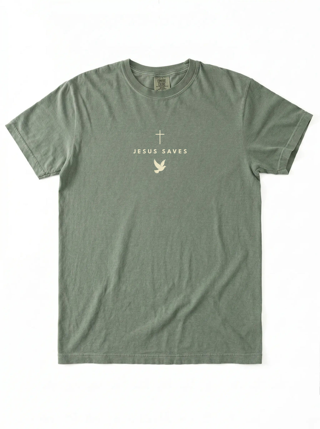 Faded green T-shirt laid flat with a light cross, “JESUS SAVES” text, and dove graphic.