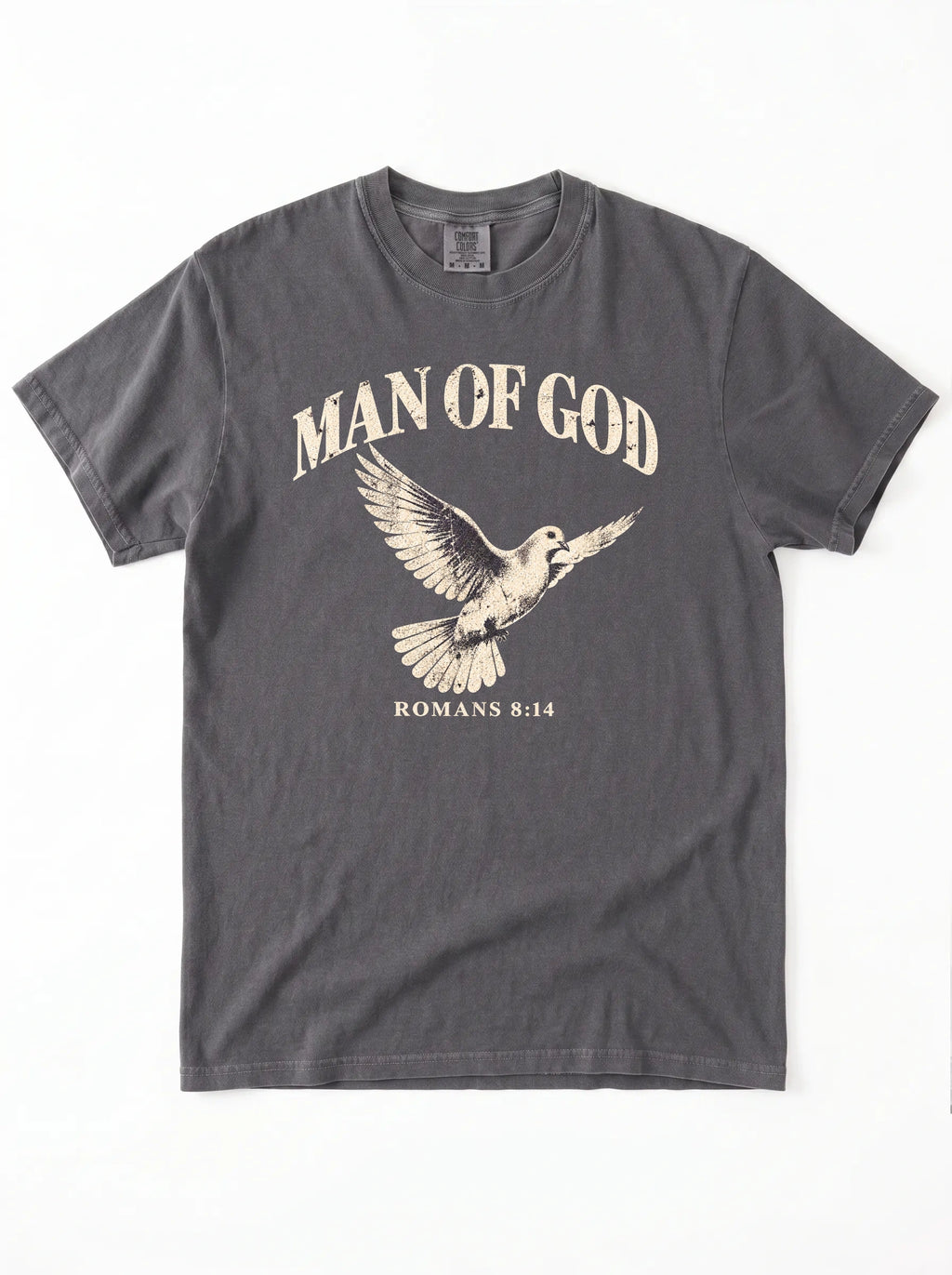 Charcoal T-shirt laid flat with a flying dove and the text “Man of God” and “Romans 8:14.”