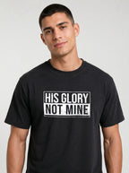 Close-up of His Glory Not Mine graphic on black Comfort Colors tee