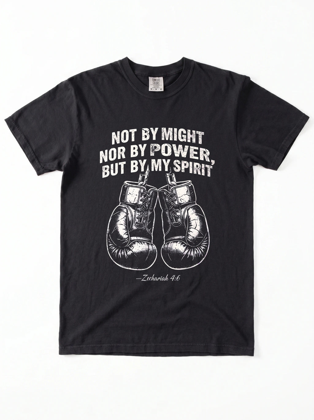 A black short-sleeve crewneck t-shirt featuring a white graphic print of a motivational quote from Jeremiah 4:6 above a pair of boxing gloves. The text reads 'NOT BY MIGHT NOR BY POWER, BUT BY MY SPIRIT'.