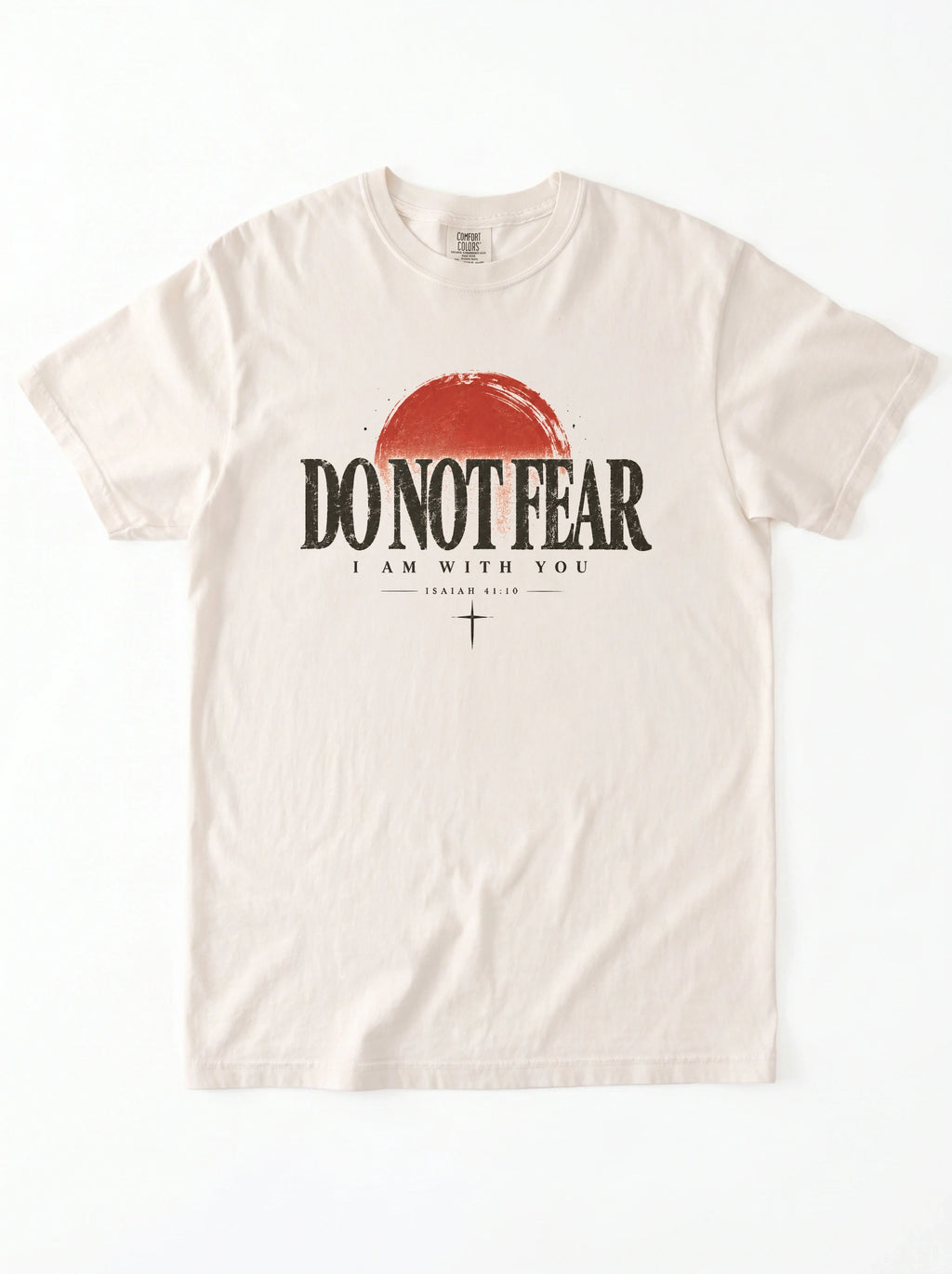 An off-white crewneck t-shirt featuring a distressed graphic of a red half-sunset and the text 'DO NOT FEAR' and 'I AM WITH YOU' in black.