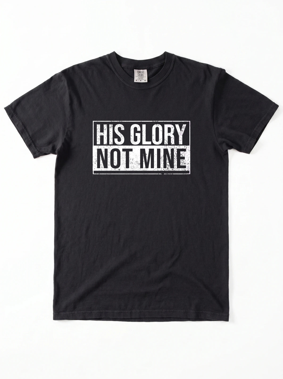 Flat lay of black His Glory Not Mine Comfort Colors 1717 t-shirt