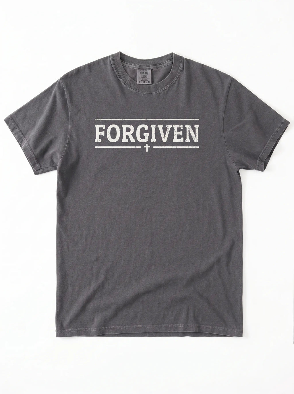 A dark gray crewneck t-shirt with 'FORGIVEN' printed in white block letters across the chest, flanked by two horizontal lines and a small cross in the center, shown flat on a white background.