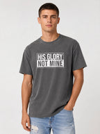 Man wearing gray His Glory Not Mine Comfort Colors t-shirt with jeans