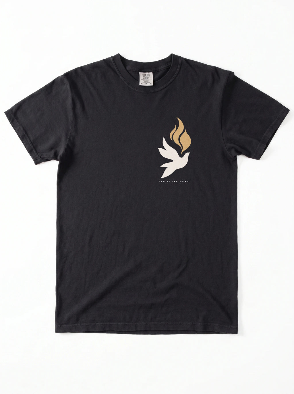 Black T-shirt laid flat with a small white dove, gold flames, and “LED BY THE SPIRIT” on the chest.