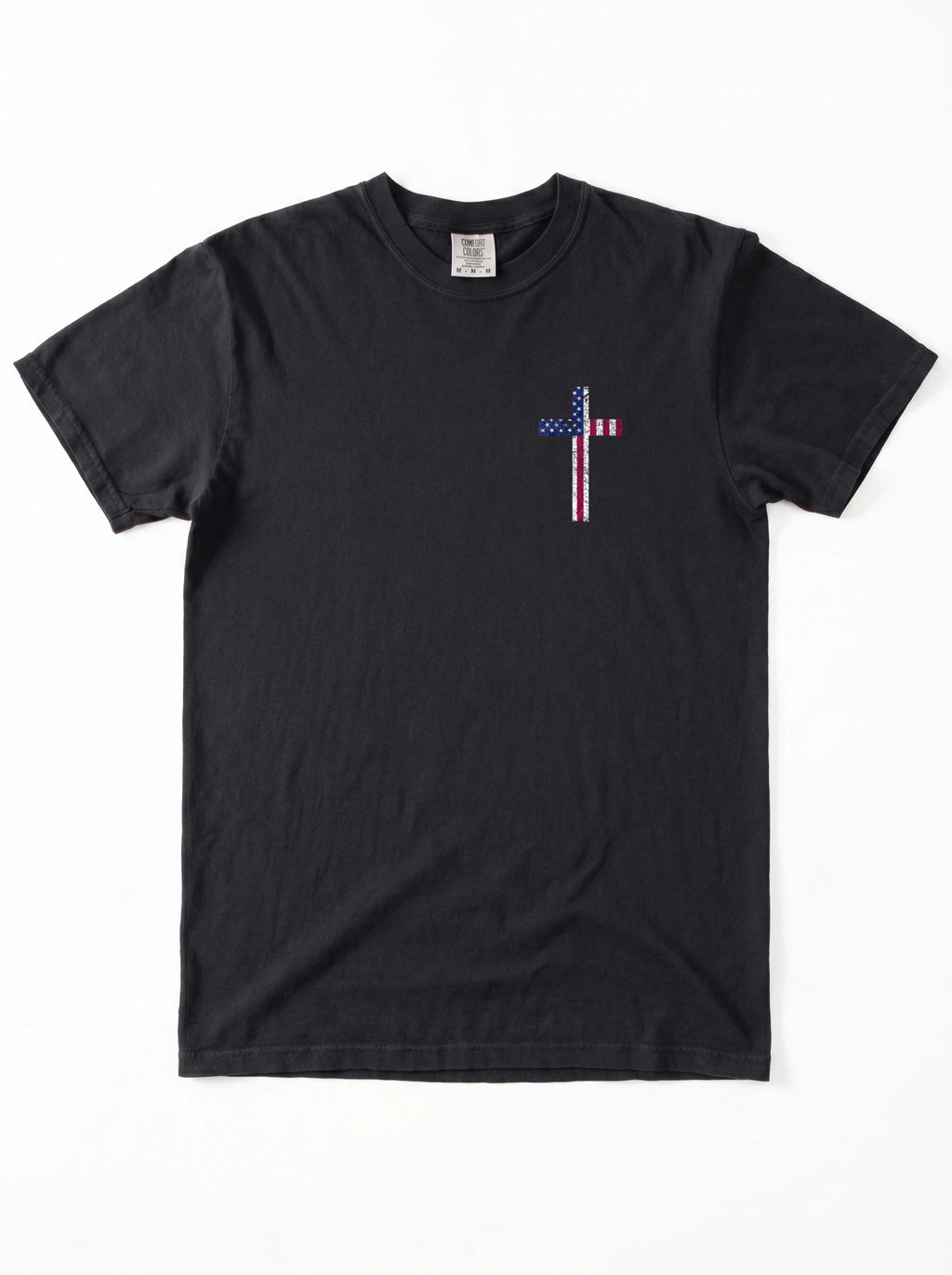 A black short-sleeve crewneck t-shirt with a small cross-shaped American flag graphic on the left chest, displayed flat against a white background.