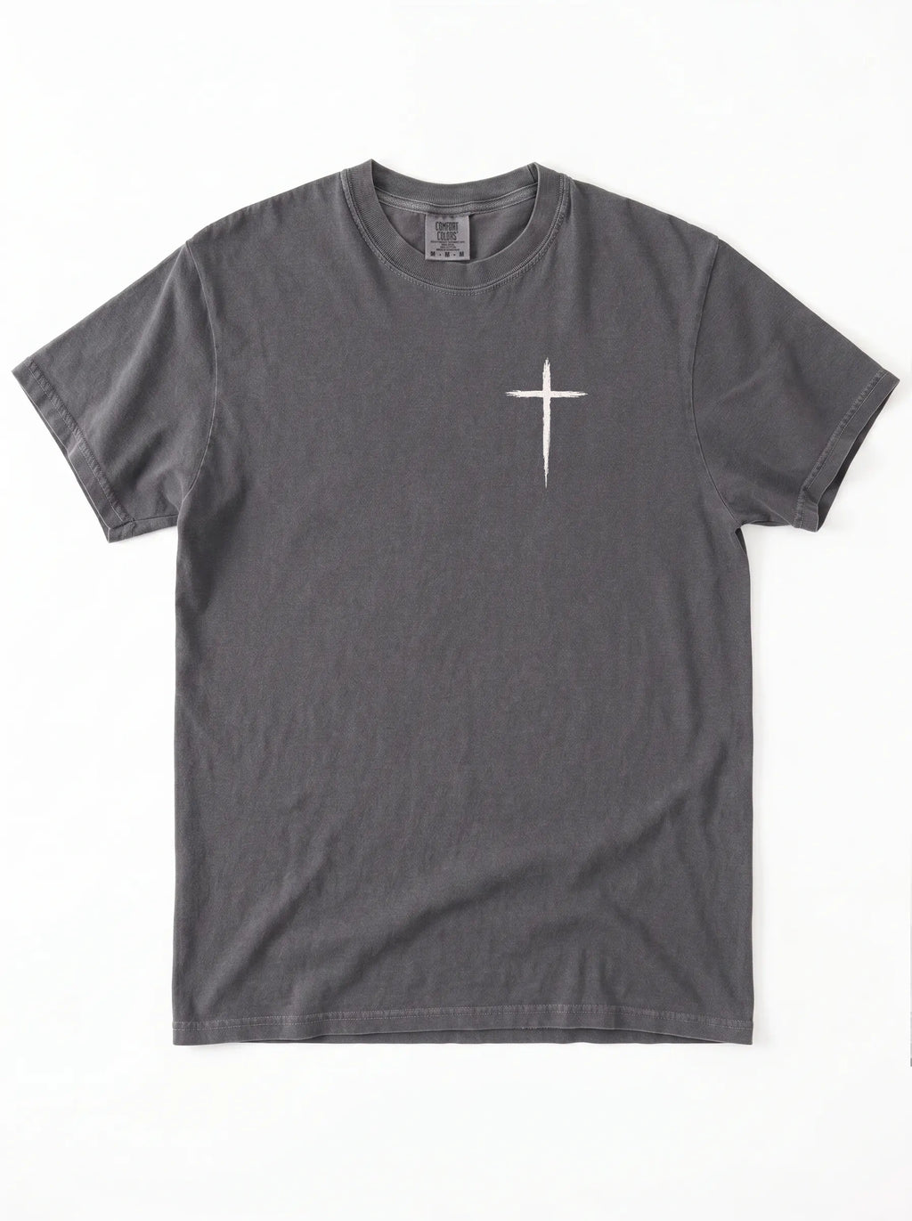 Gray T-shirt laid flat with a small white cross printed on the chest.