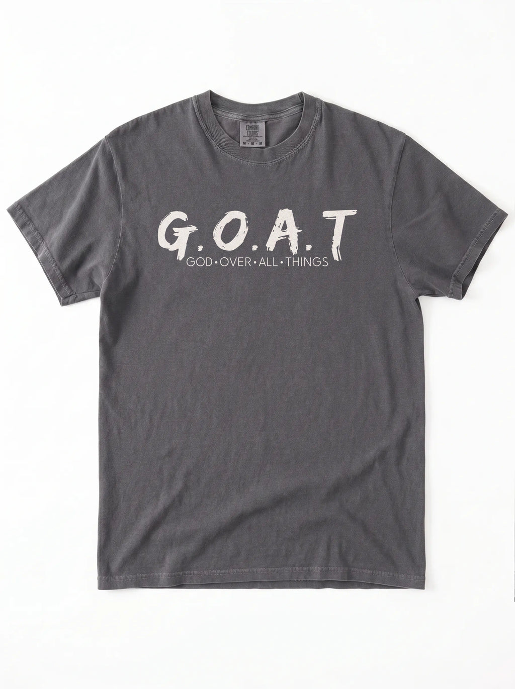 A dark gray short-sleeve t-shirt with 'G.O.A.T GOD OVER ALL THINGS' print across the chest.