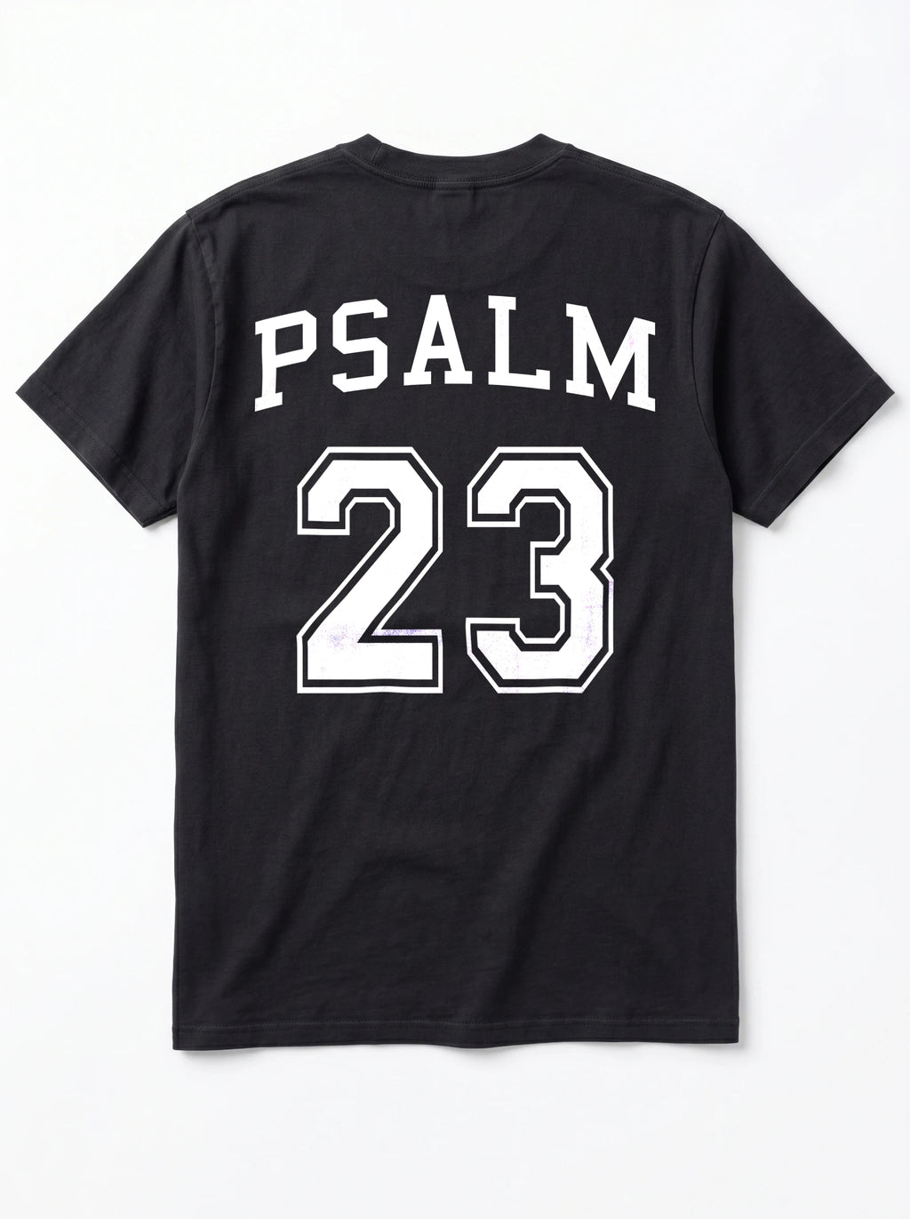 Flat lay of black Comfort Colors t-shirt, back view with Psalm 23 varsity graphic print