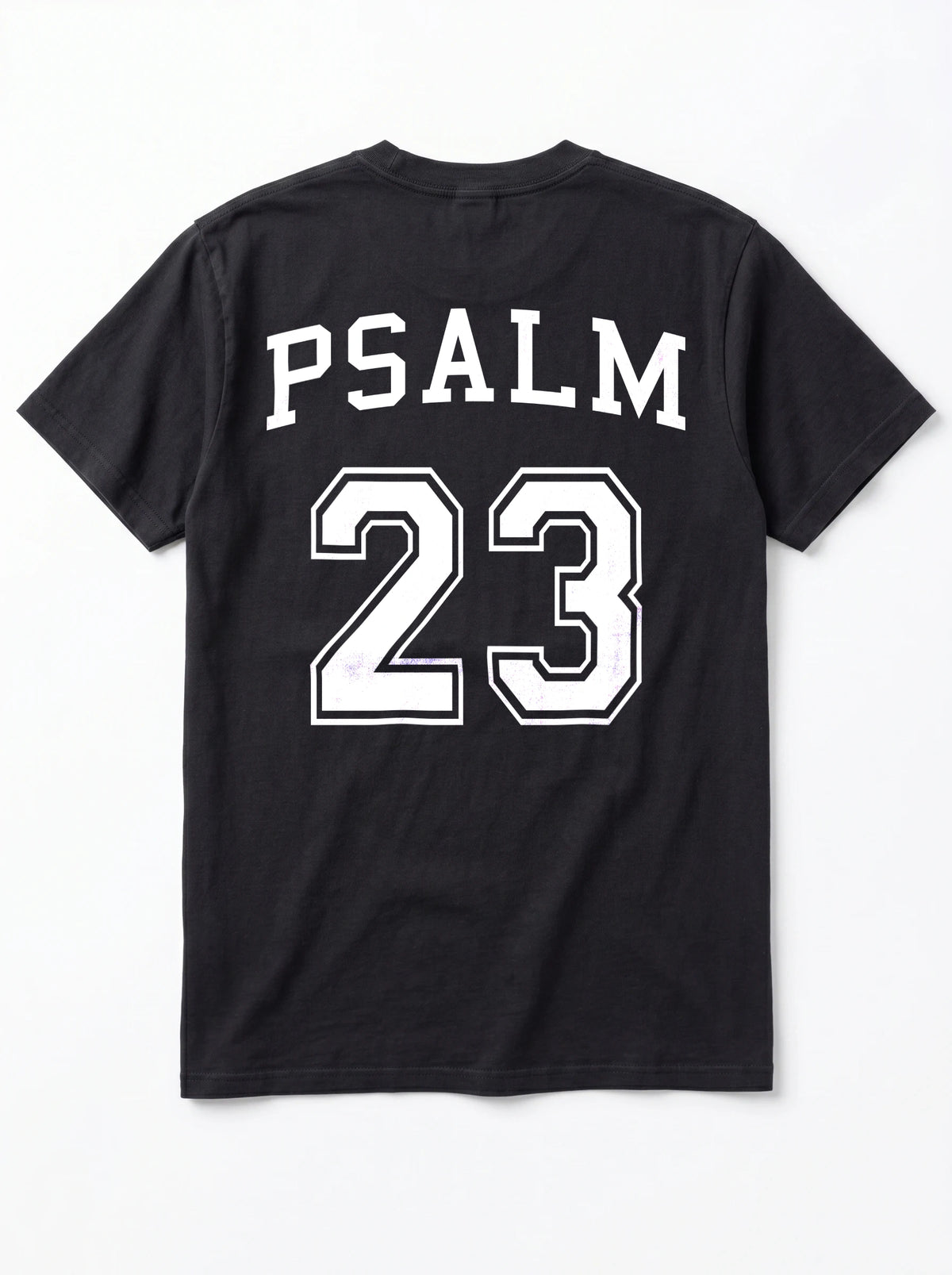 Flat lay of black Comfort Colors t-shirt, back view with Psalm 23 varsity graphic print