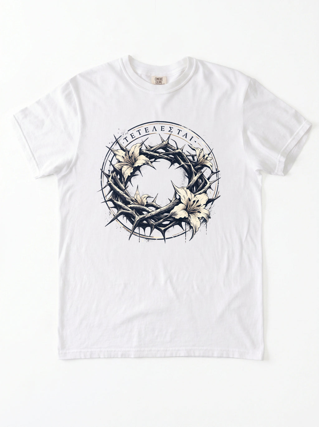 A white short-sleeve crewneck t-shirt featuring a graphic print of a crown of thorns and white lilies, featuring Greek text.