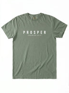 An olive green short-sleeve t-shirt with 'PROSPER' and 'JEREMIAH 29:11' printed in white on the chest, laid flat against a white background.