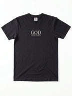 A black short-sleeve crewneck t-shirt with the words 'GOD IS ENOUGH.' printed in a light beige serif font on the chest, displayed flat against a white background.