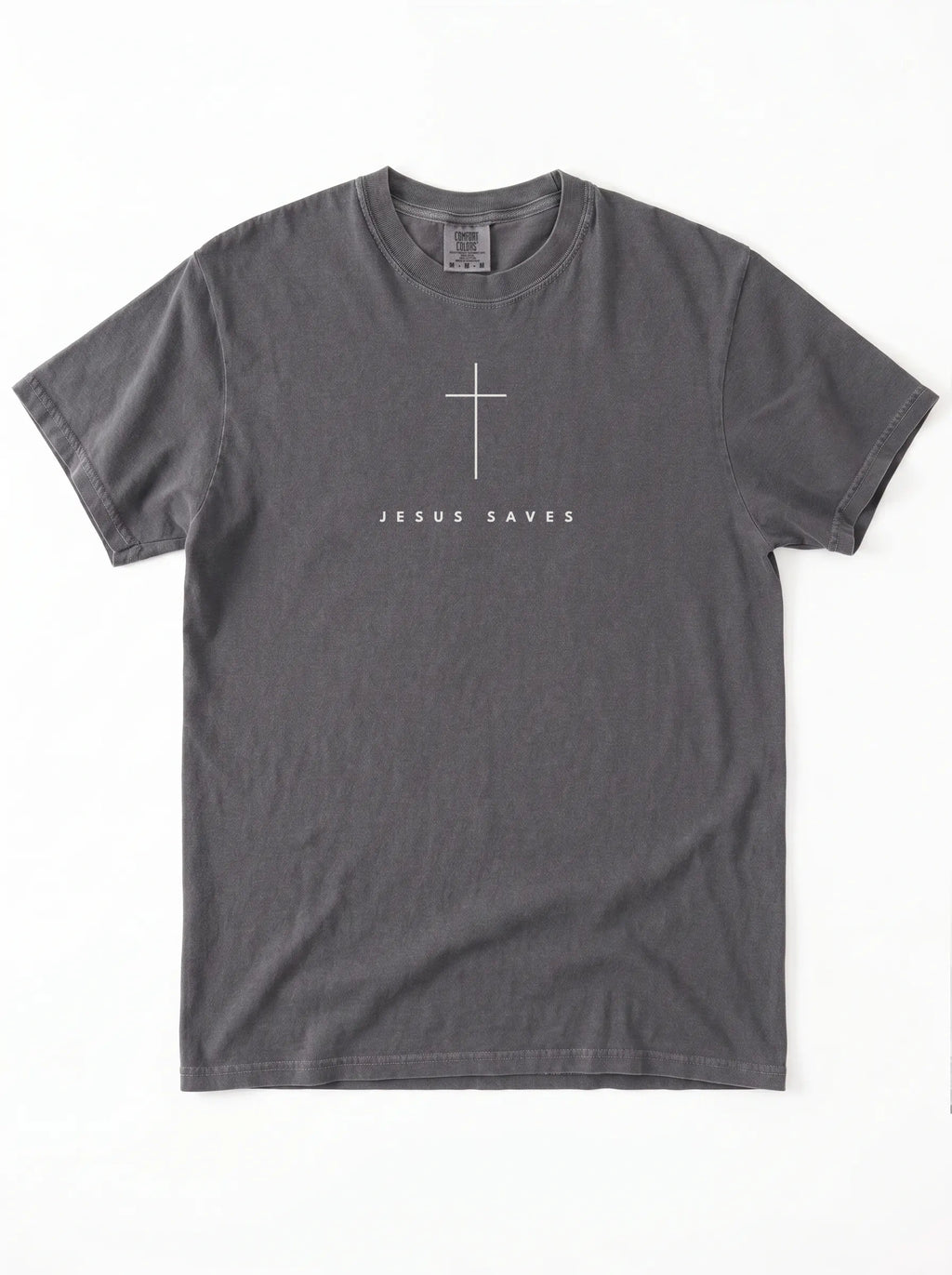 Washed dark gray T-shirt laid flat, featuring a white cross above the text “Jesus Saves.”