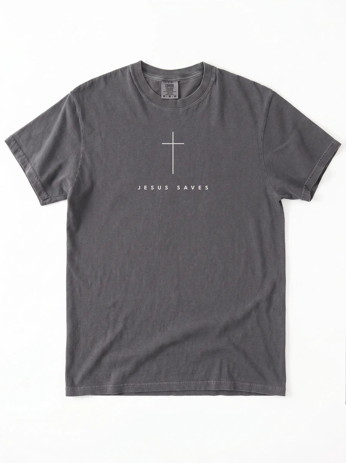 Washed dark gray T-shirt laid flat, featuring a white cross above the text “Jesus Saves.”