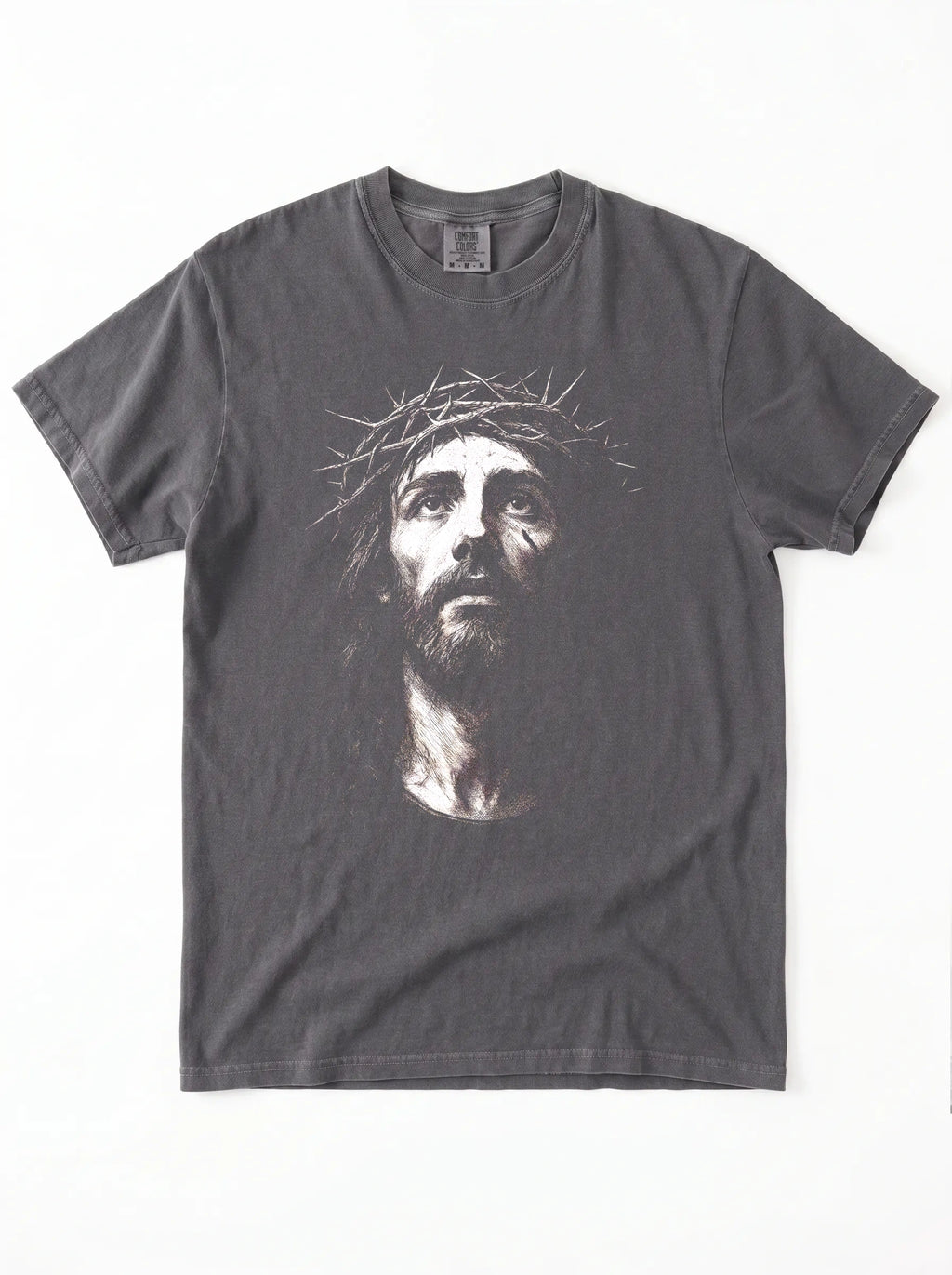A dark gray crewneck t-shirt featuring a high-contrast graphic print of Jesus Christ's face wearing a crown of thorns, displayed flat against a white background.