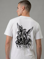 White T-shirt with a winged warrior defeating a dragon and the text “VICTORY OVER DARKNESS” and “REVELATION 12.”