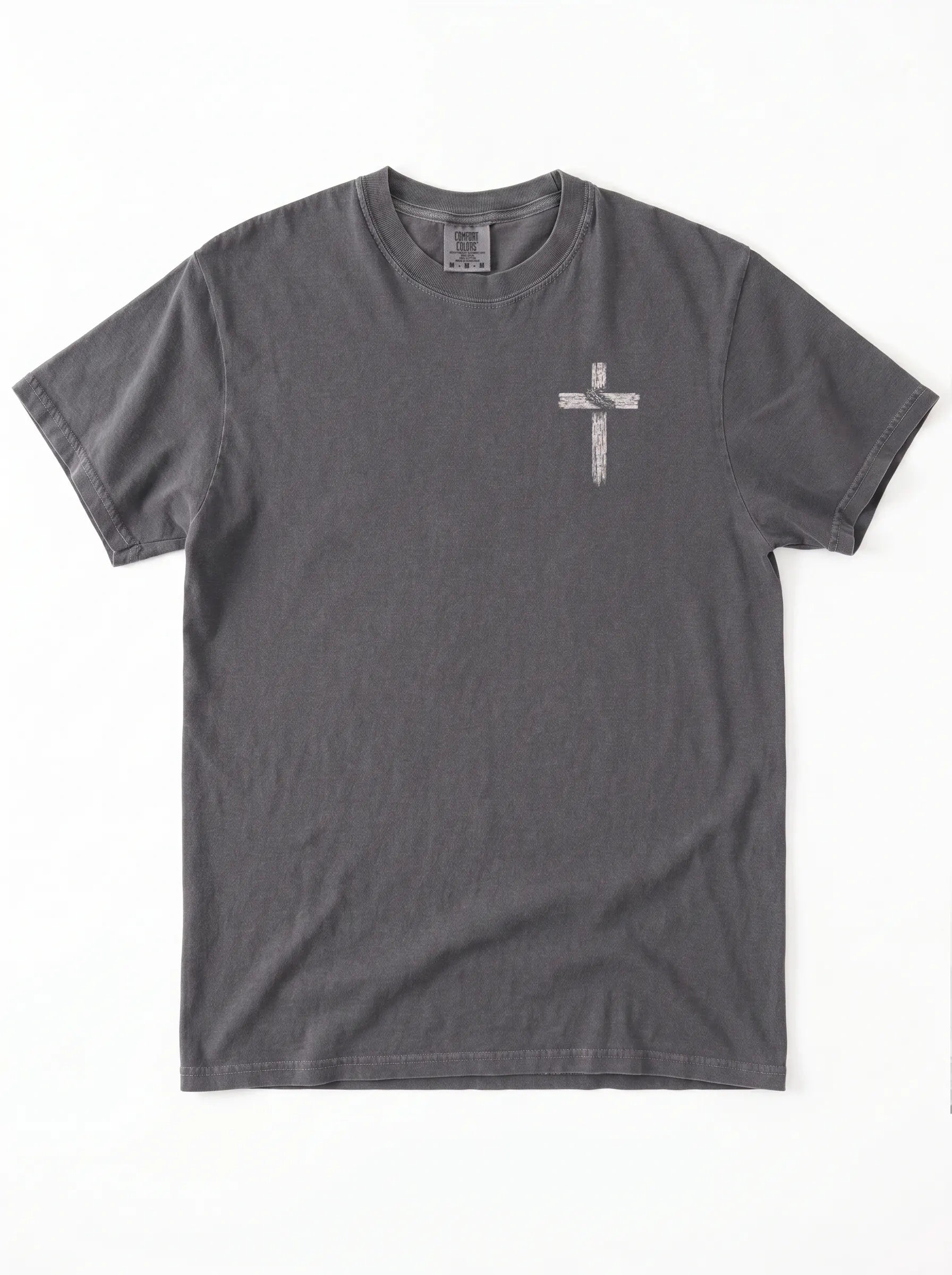 A dark gray short-sleeve crewneck t-shirt with a small white cross graphic printed on the left chest, displayed flat against a white background.