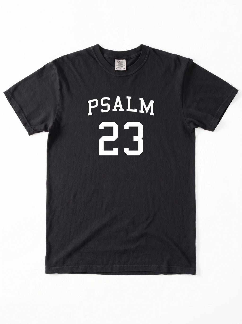 Flat lay of black Comfort Colors t-shirt, front view with Psalm 23 varsity graphic print