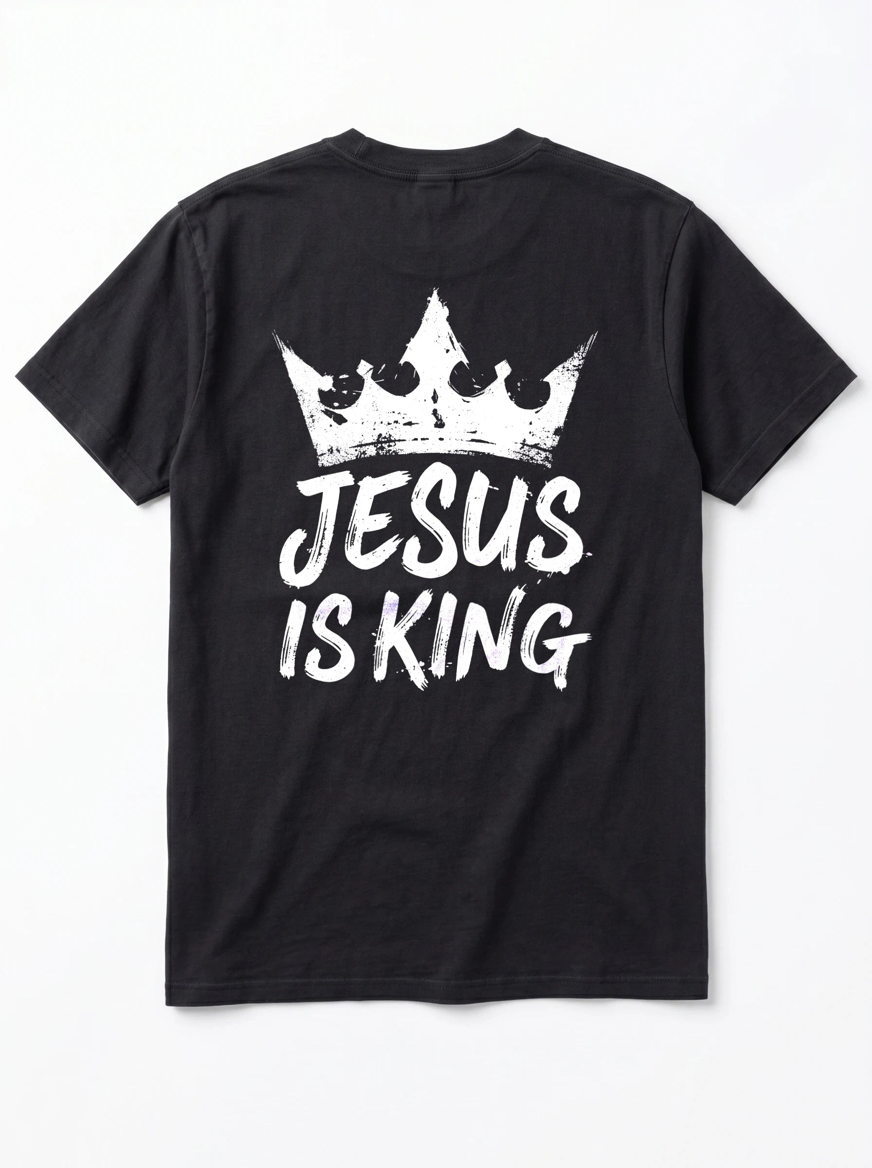A black short-sleeve t-shirt shown from the back, featuring a distressed white graphic of a crown above the text 'JESUS IS KING' in a bold, hand-drawn font.