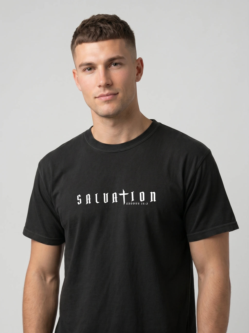 Person wearing a black T-shirt with white “Salvation” and “Exodus 15:2” text across the chest.