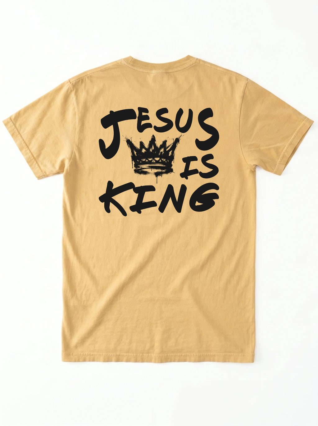 A tan short-sleeve t-shirt shown from the back, featuring a black graphic print that reads 'JESUS IS KING' with a crown illustration in the center, laid flat against a white background.