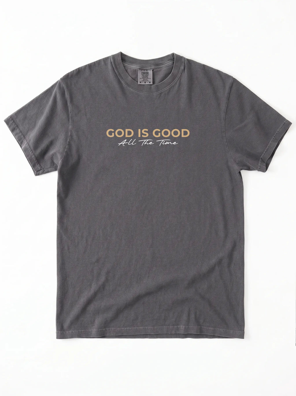 Charcoal grey “God Is Good All The Time” Christian graphic T-shirt laid flat on white background.
