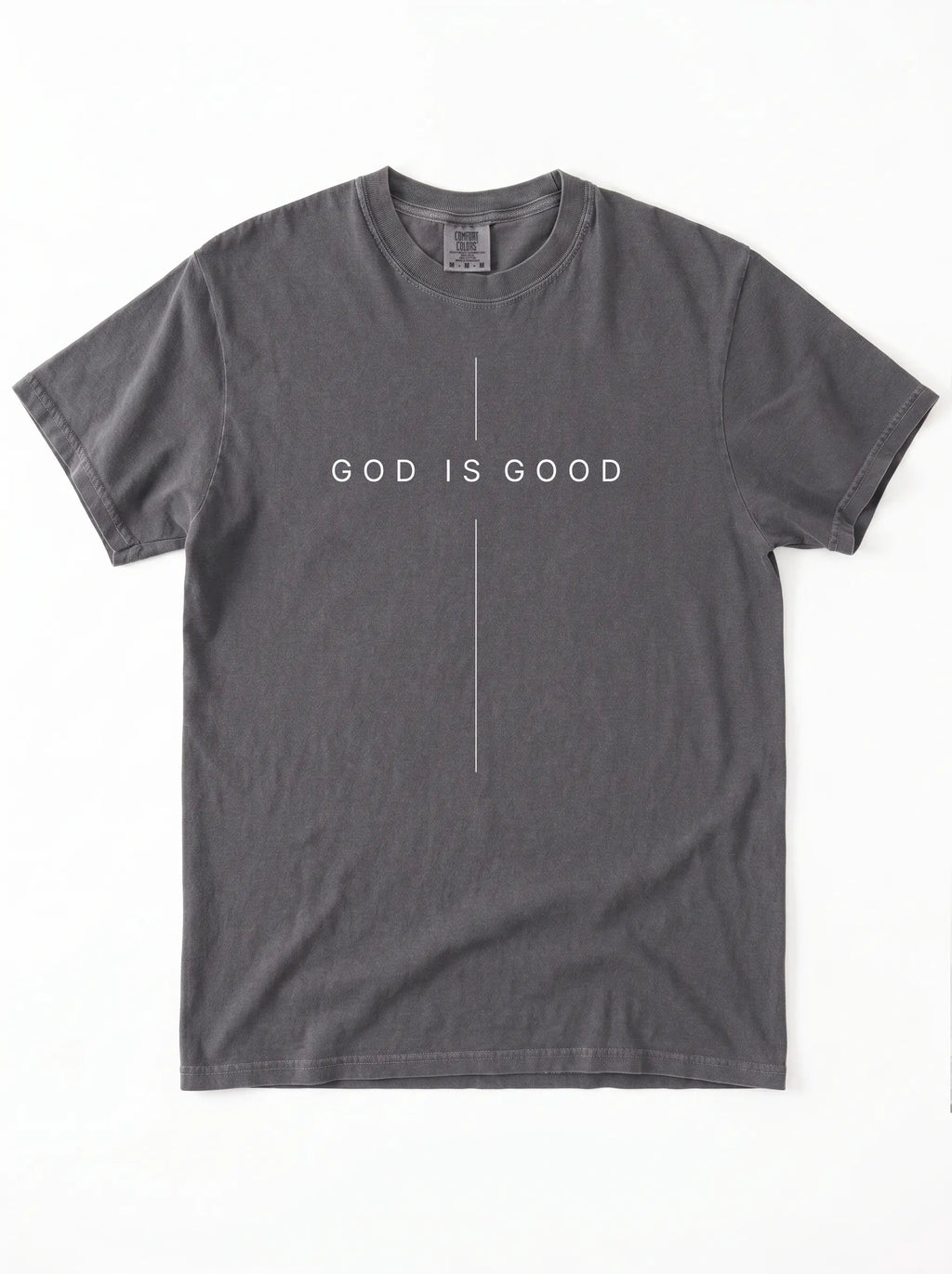 A dark gray crewneck t-shirt with 'GOD IS GOOD' printed in white across the chest, divided by a vertical line, on a plain white background.