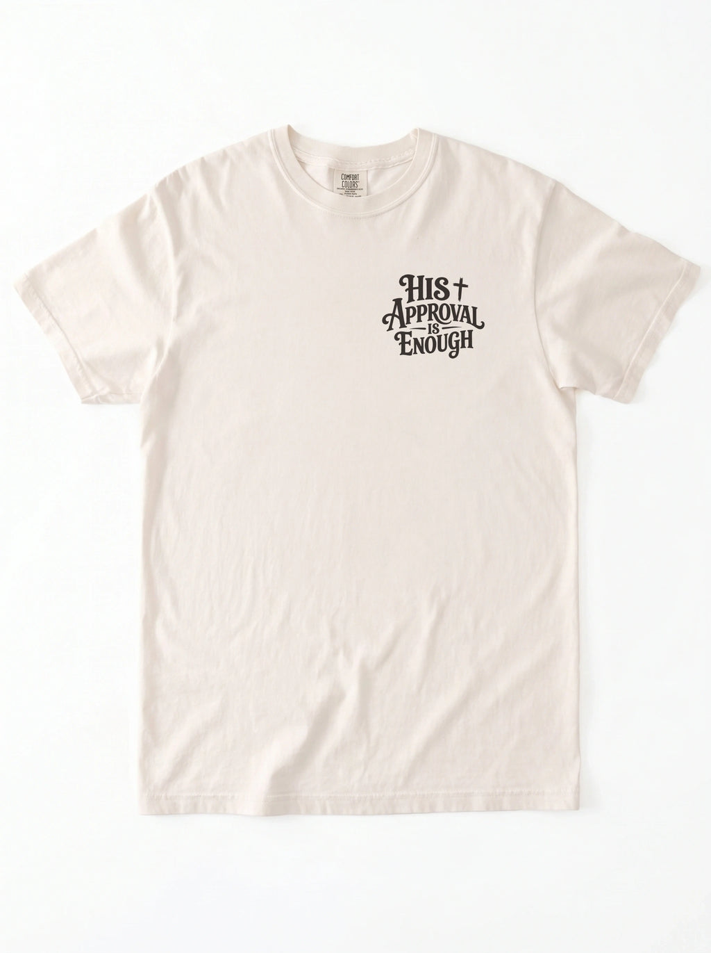 Flat lay of cream Comfort Colors garment-dyed t-shirt with 'His Approval Is Enough' chest print, front view